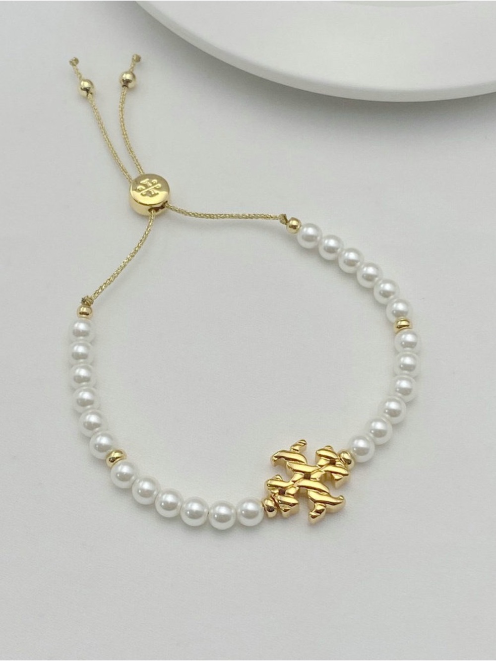 Tory Burch Gold and White Pearl Logo Adjustable Bracelet